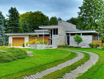 Consider green building methods for every part of your home design, including your driveway, which can reduce storm water run-off. Source: Houzz
